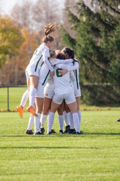 WINNERS — The womens soccer team celebrates following their win against UW-Parkside and earning their first ever GLIAC tournament champion title.
Photo courtesy of Anna Melnikoff