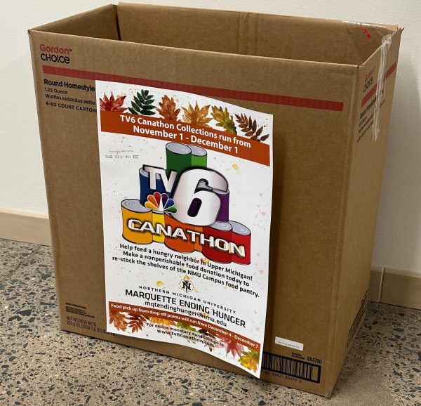 TV6 CANATHON — Marquette Ending Hunger has placed 17 donation boxes — like the one pictured above — around campus in every building, including academic buildings and residence hall lobbies to collect cans for the can drive.