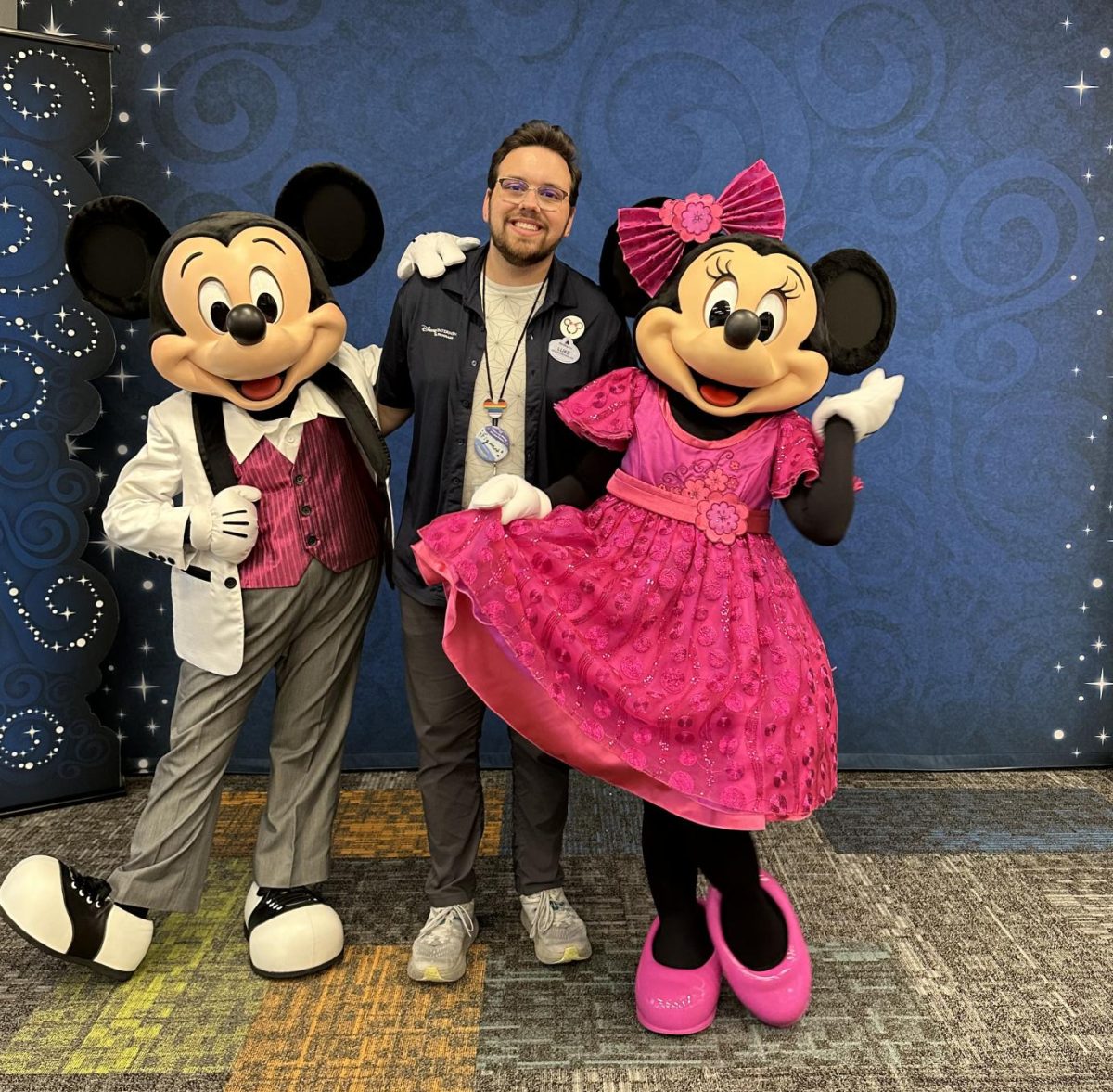 POSE — Tschumperlin poses with two of his favorite Disney characters.