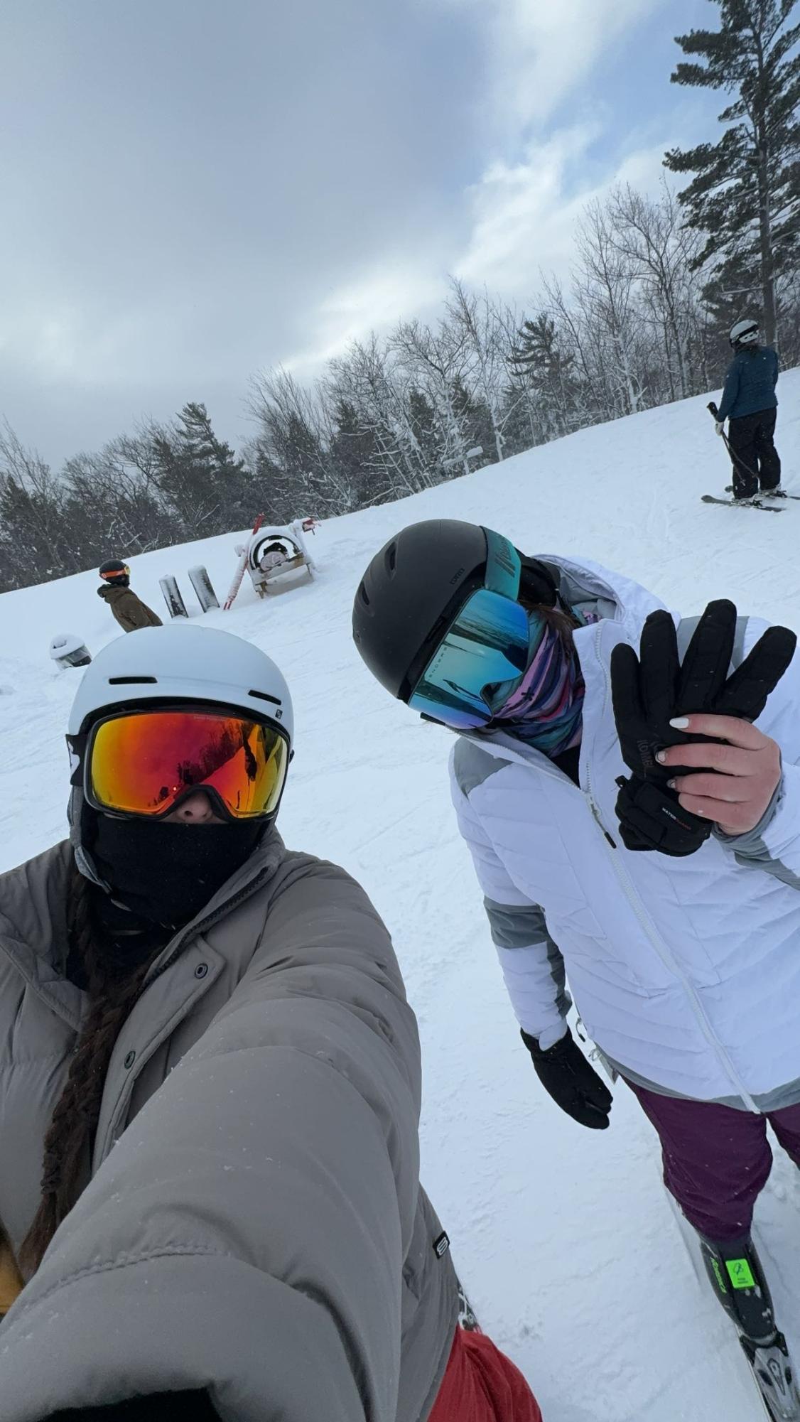 HIT THE HILL — NMU Students Julia Allen and Sami Brown are just two of the many missing the thrill of ski season with the unseasonably warm temperatures in the area. Photo Courtesy of Sami Brown