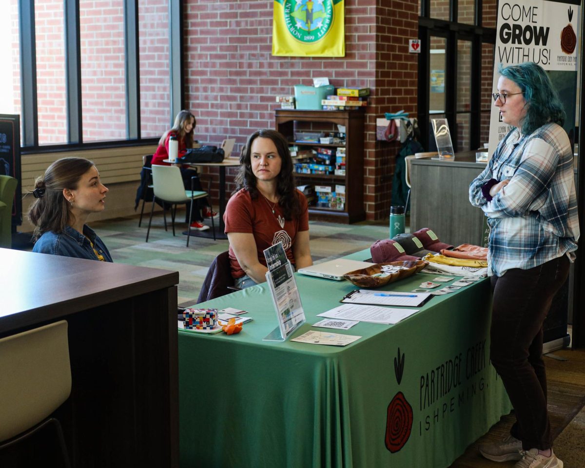 LOCAL INTERNSHIPS — Partridge Creek Farms in Ispheming hosts tabling event in Jamrich Hall to encourage students to apply to upcoming fall and summer internships.
