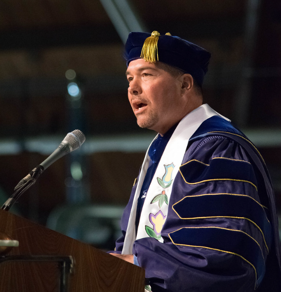 Marty Reinhardt giving his faculty commencement speech during NMUs 2016 graduation ceremony. This was the first year NMU offered a Native American Studies major.