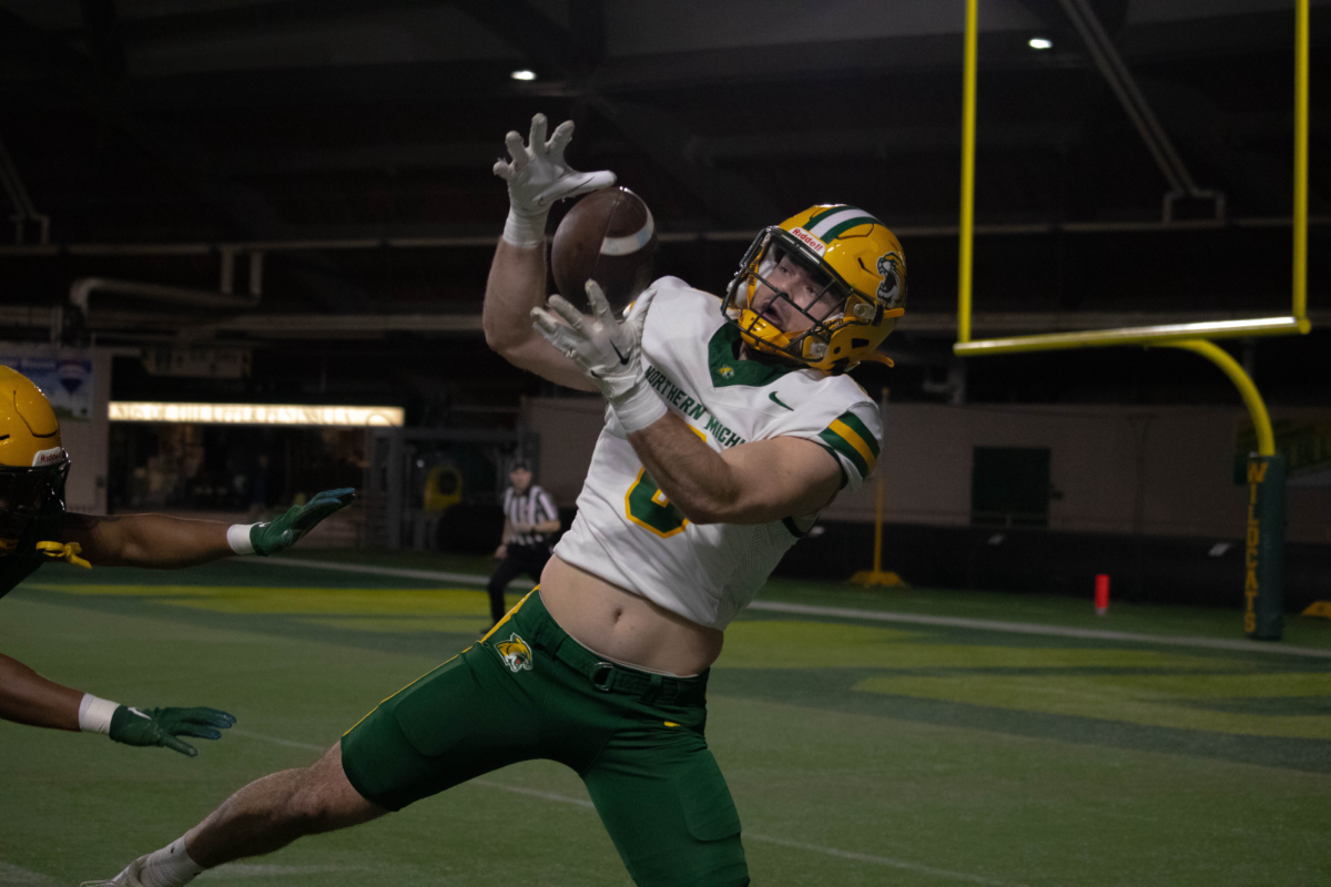 ACTION PACKED — NMU played its annual spring game last Saturday. 