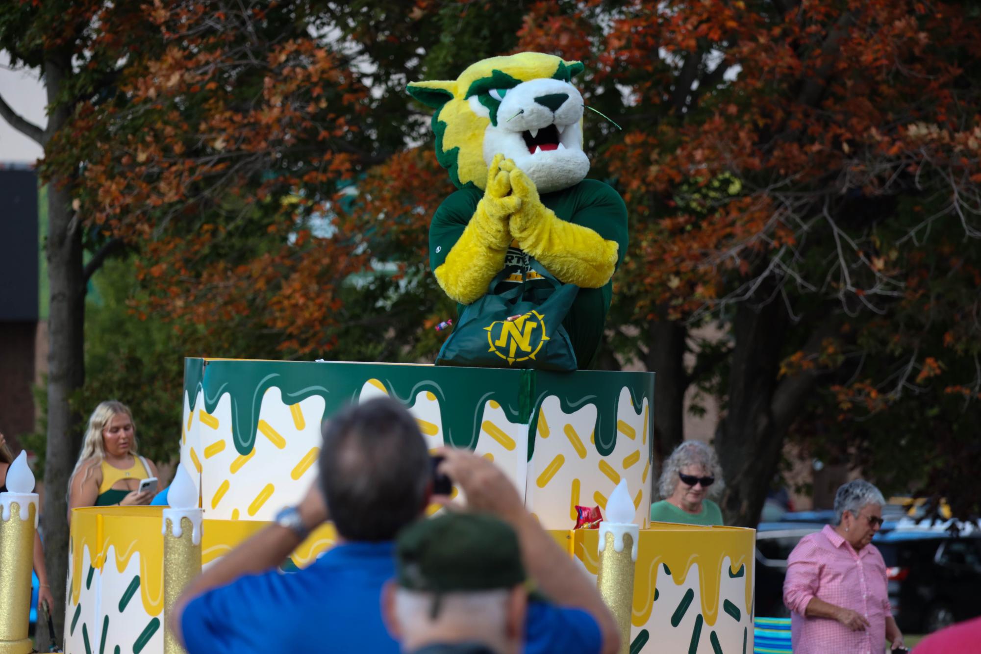 Golf carts, candy and campus pride shine at 125th Homecoming Parade