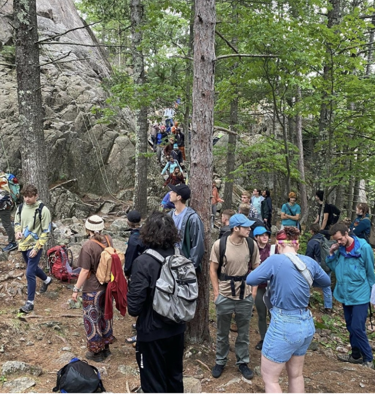 CHAT AND CLIMB — At a social climb, SSCC members new and returning gather and learn the ins and outs of their sport.