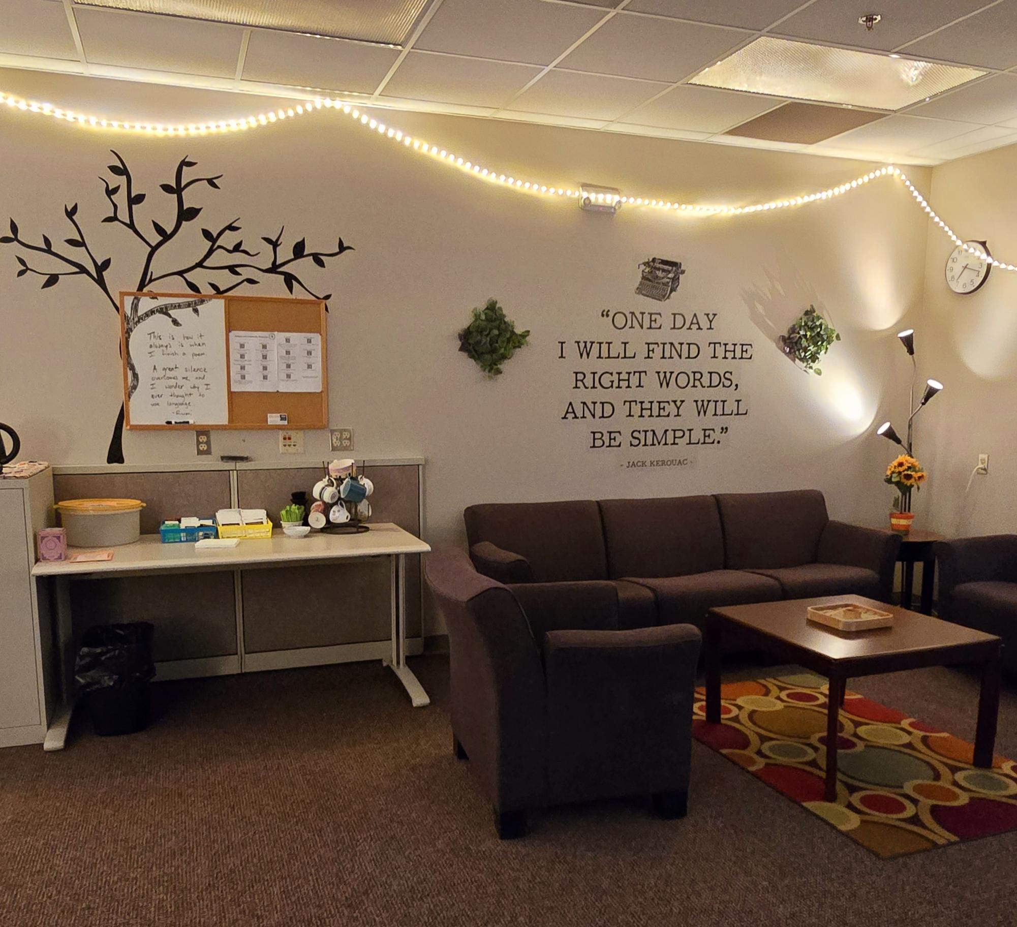 Cozy Cram Session - The waiting area of the Writing Center is decked out with lighting and wall decor to create a welcoming environment for students.