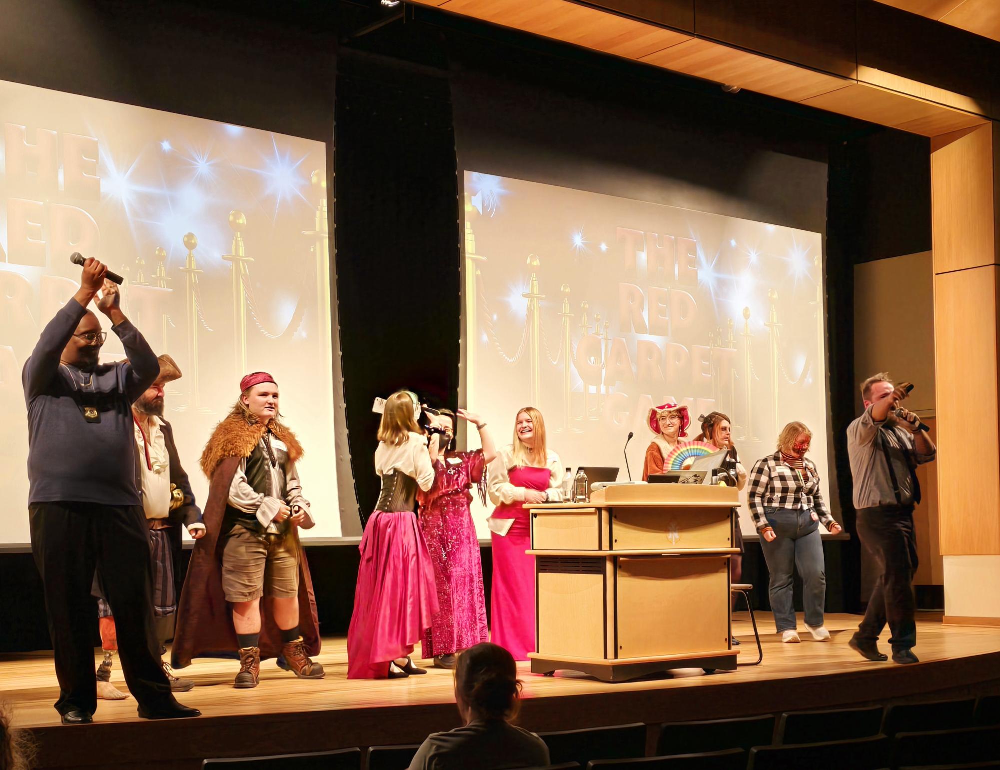 COSTUME CRAZE — Students show off their costumes to the crowd in the midst of a mysterious kidnapping investigation.