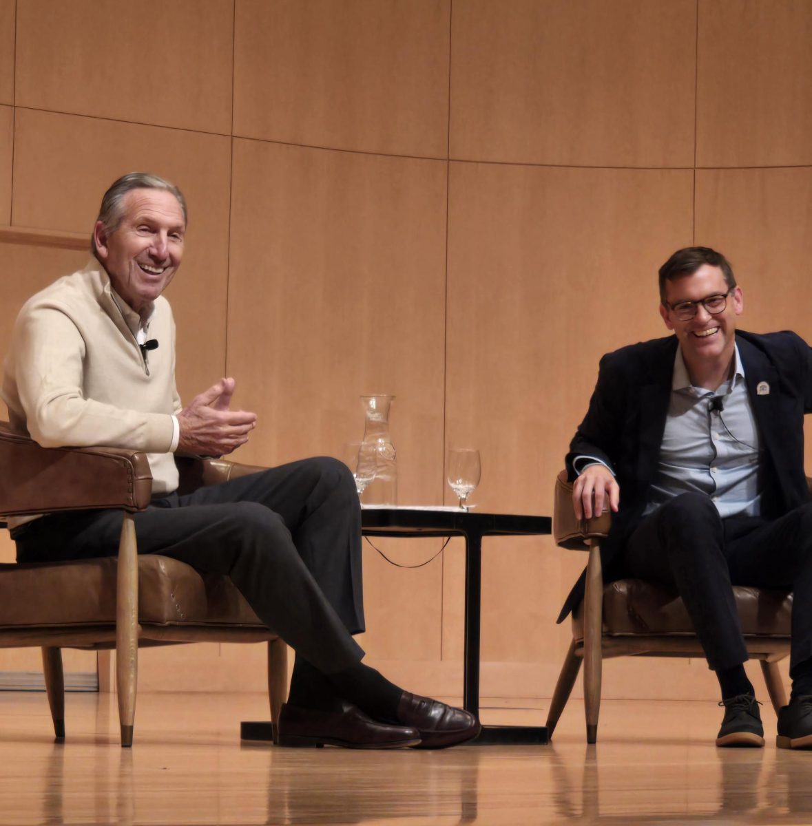 LEGENDARY DUO — President Brock Tessman and former Starbucks CEO Howard Schultz speak with NMU students.