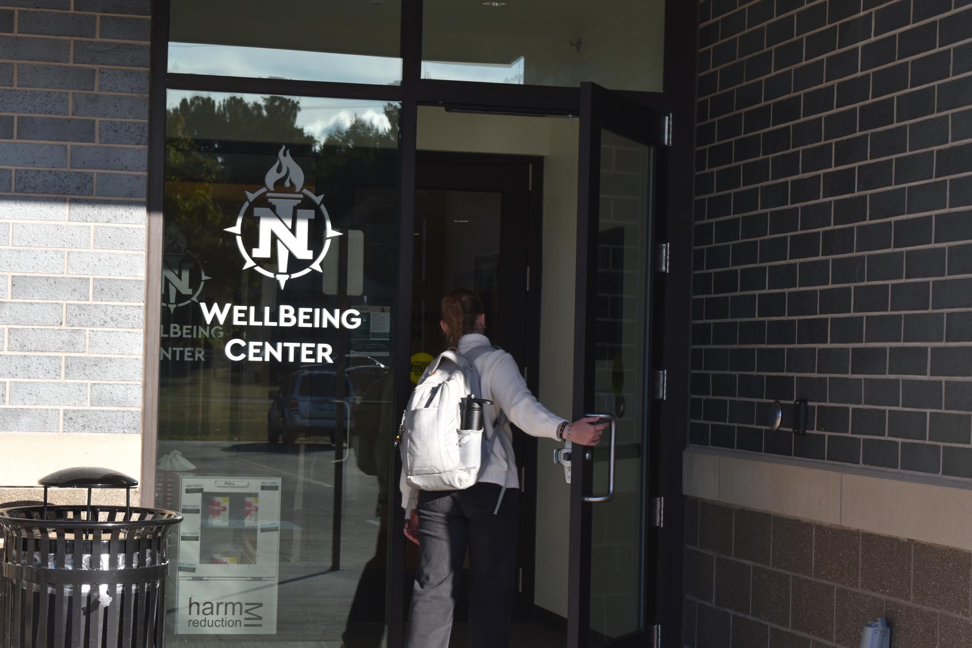 BIG STEPS — A student walks into NMU's WellBeing Center, one of many places a student can utilize in order to make their college transition smoother.