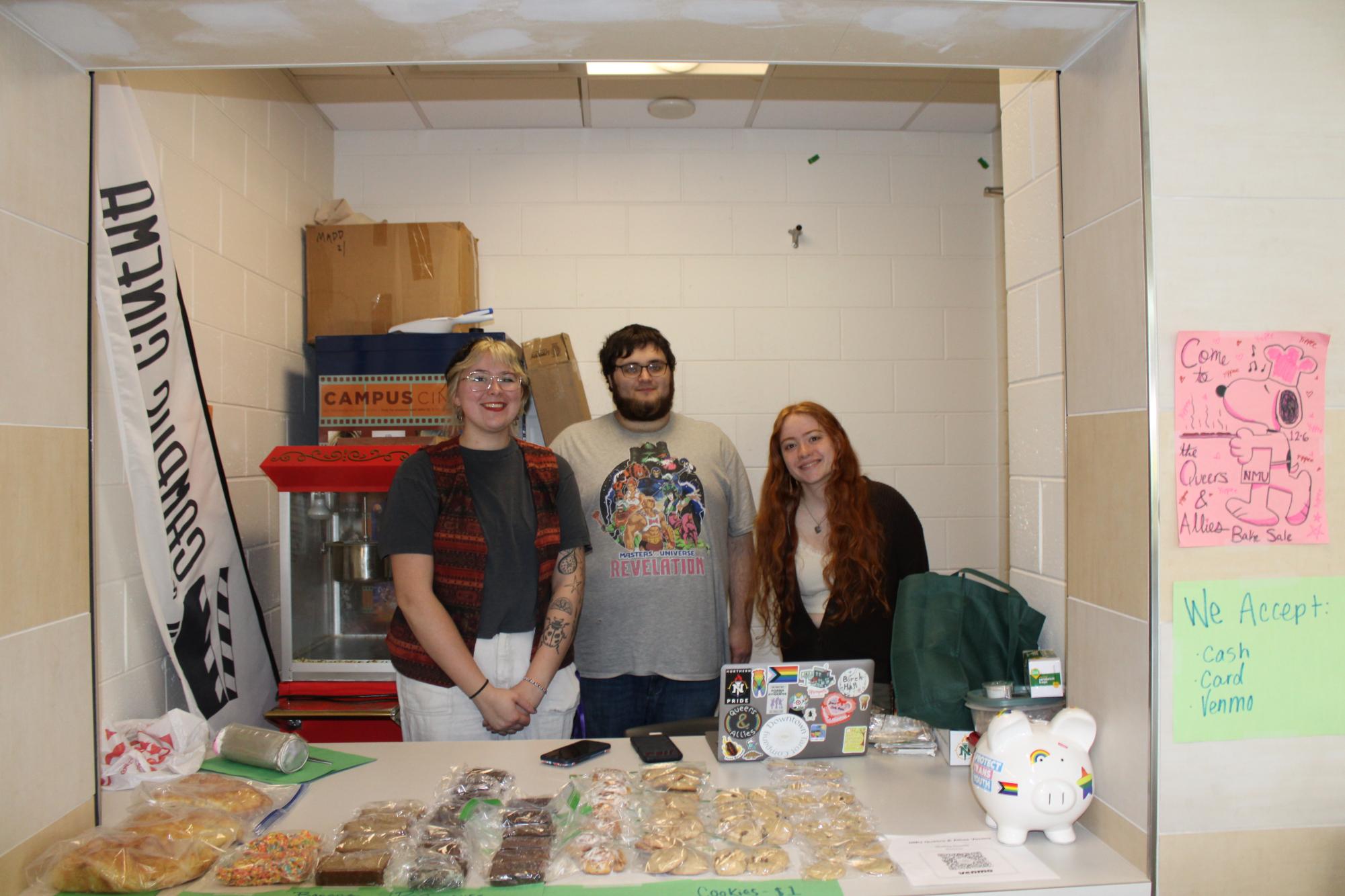 TEAMWORK - Members of the Queers and Allies club work together to sell baked goods to students in Jamrich. 