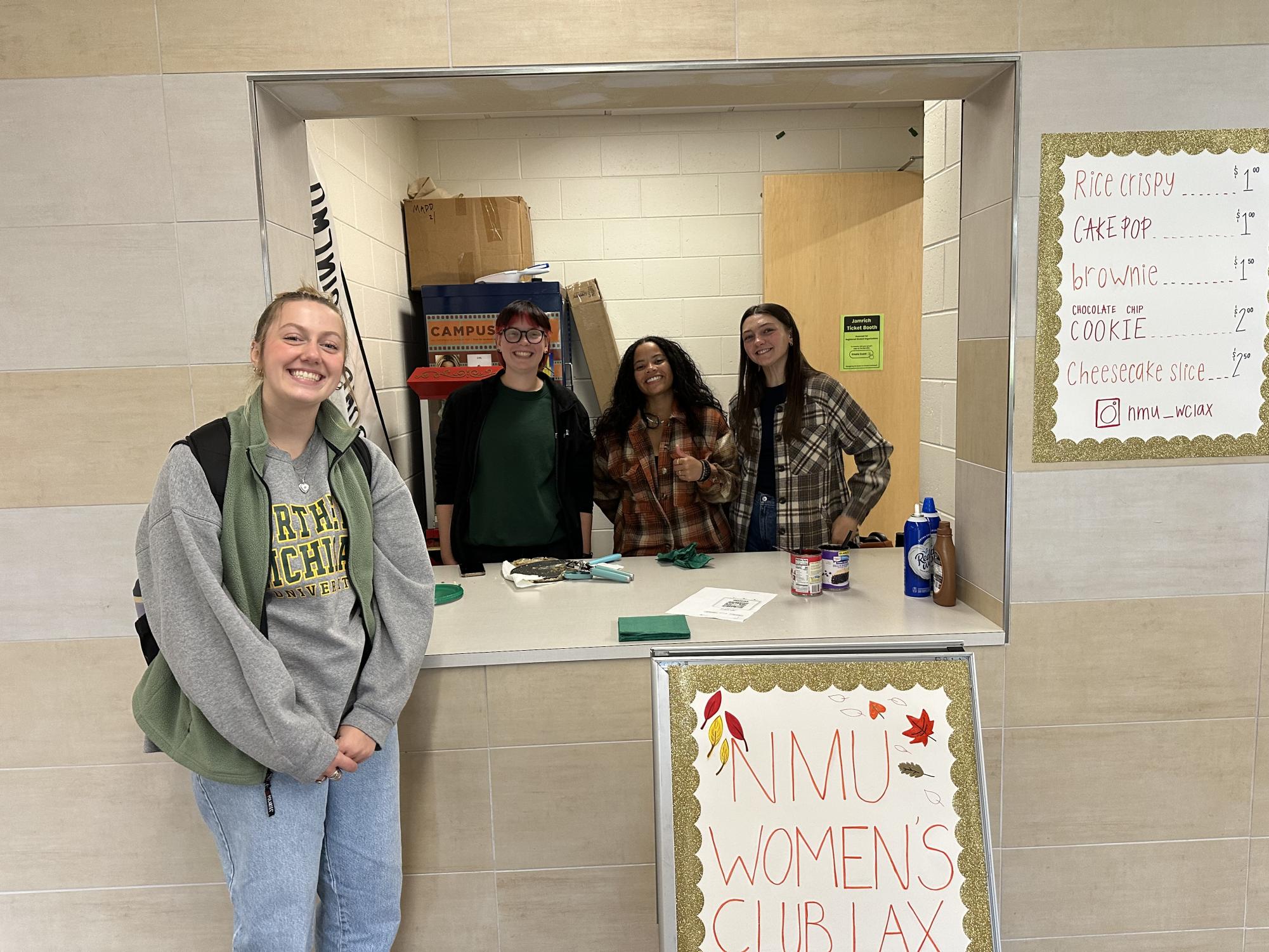 BAKE SALE - The NMU women's club lacrosse team sells out all their baked goods while raising money for their team. 