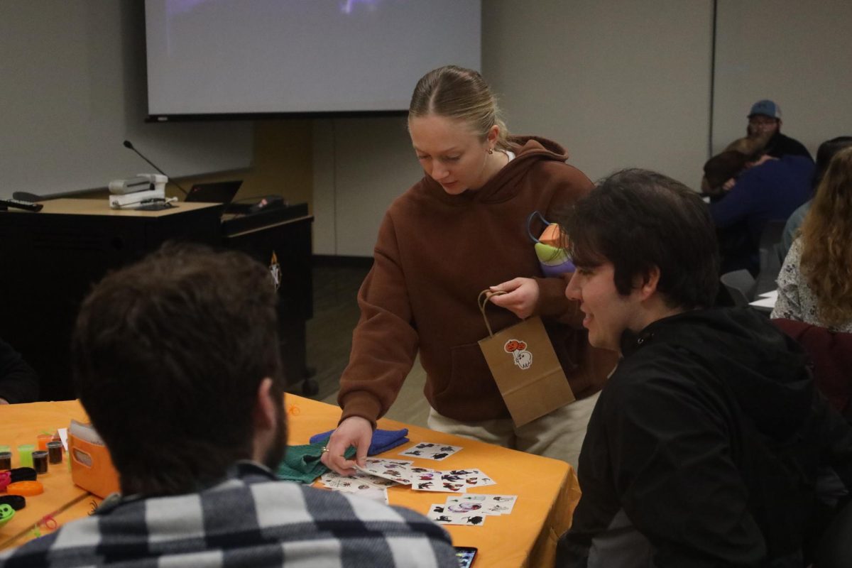 FESTIVE FUN — Students and members of Spanish Club gather to play games and make crafts for Halloween and Dia de los Muertos.