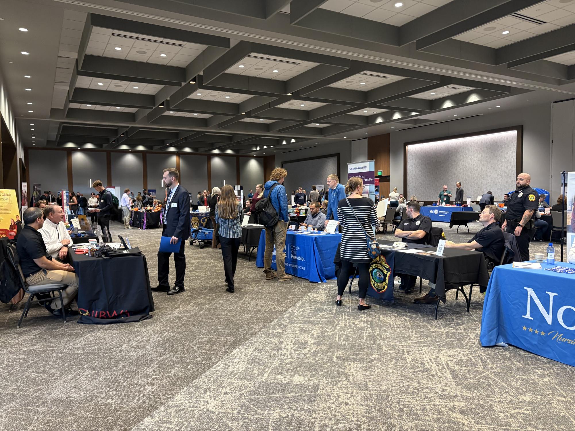 FOCUS IN - Students visit booths at the 57th Annual Fall Semester Job Fair in hopes of making connections and landing a job or internship. 