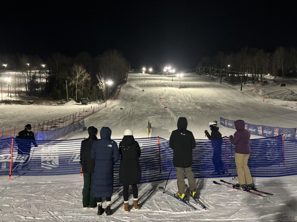 CATCH ME IF YOU CAN — Spectators gather at Marquette Mountain, waiting for ski races to start.