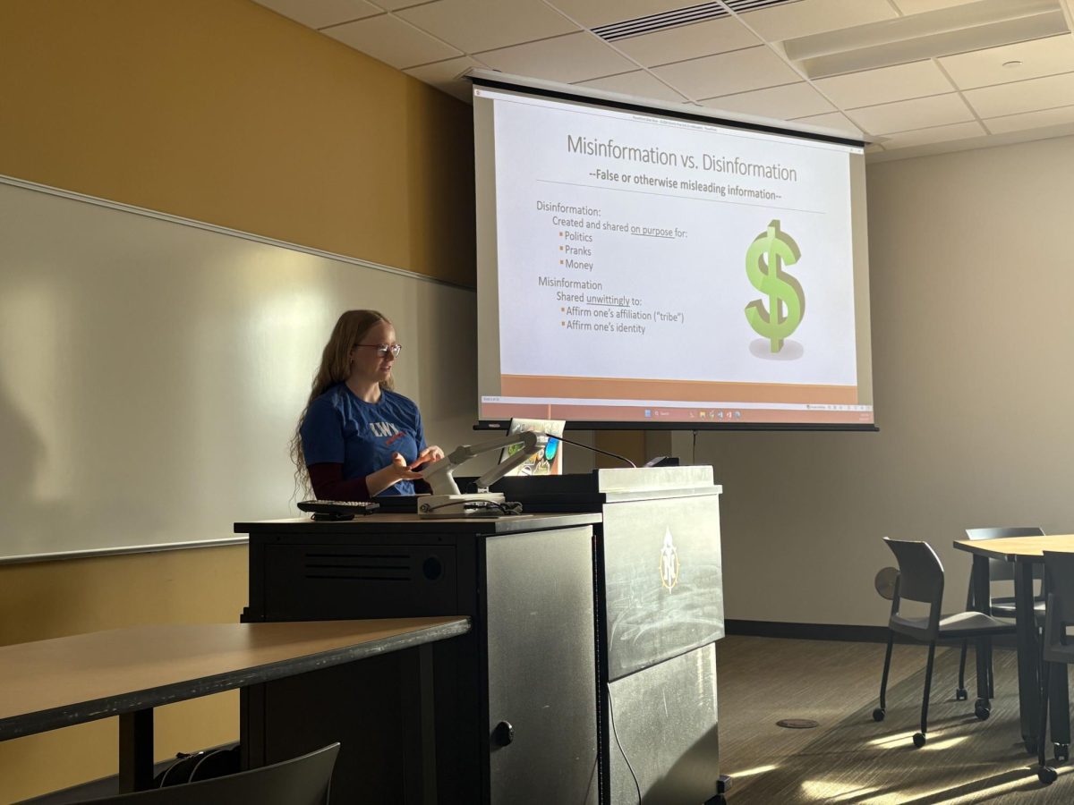 TEACH —  NMU student Libby Myren presents the difference between misinformation, disinformation and what drives someone to spread them online. 