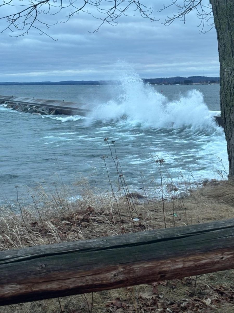 SWOOSH— Waves crash against the break wall on an eerie night at Presque Isle.