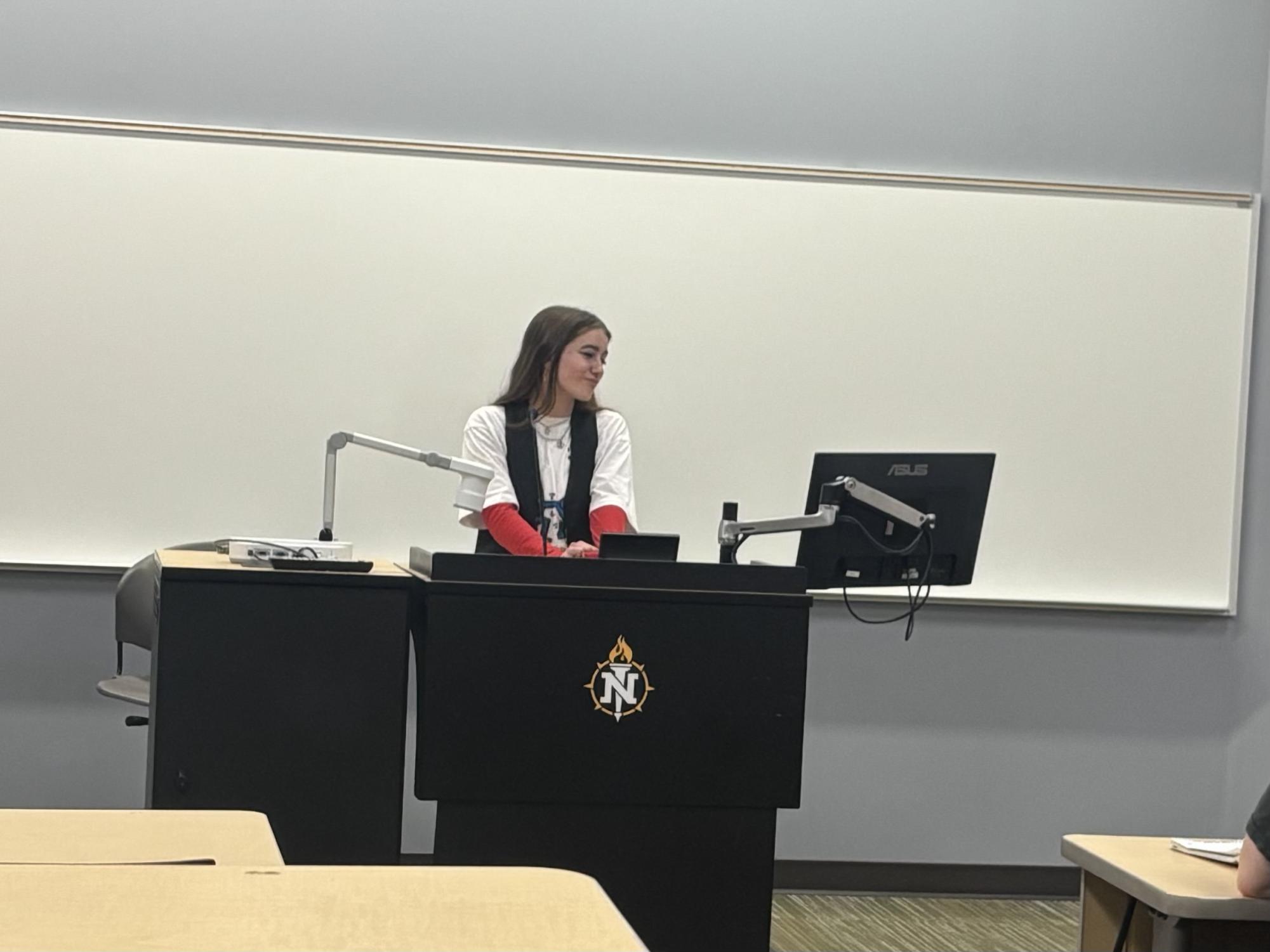 TALK ABOUT CLIMATE—  Student leader Joleena Siebler talks about environmental issues on NMU's campus at a climate 'Open Mic' hosted by Tomorrow's Voices. 
