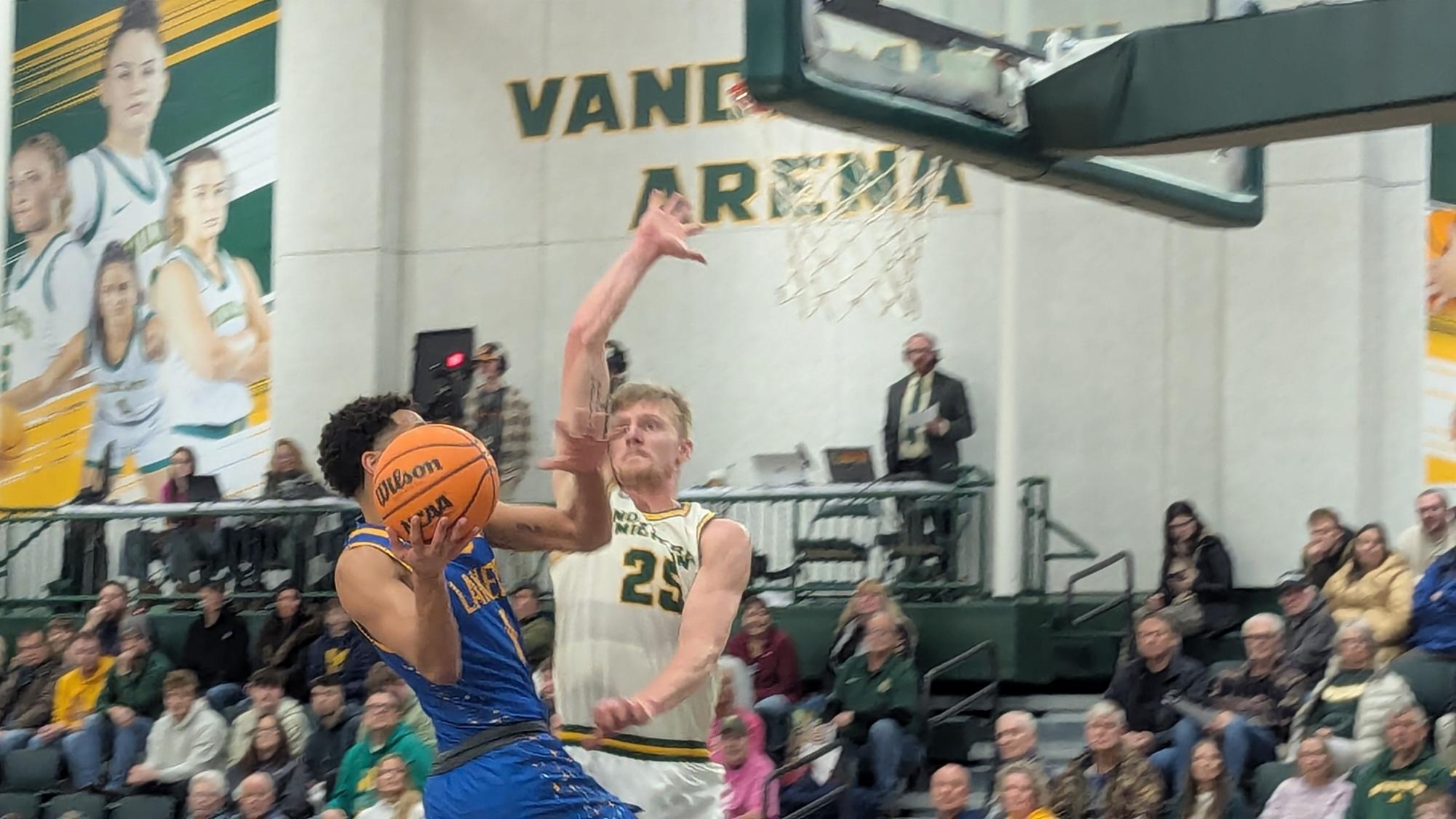 YAMS - Dylan Keuhl patrols the paint with tenacity.