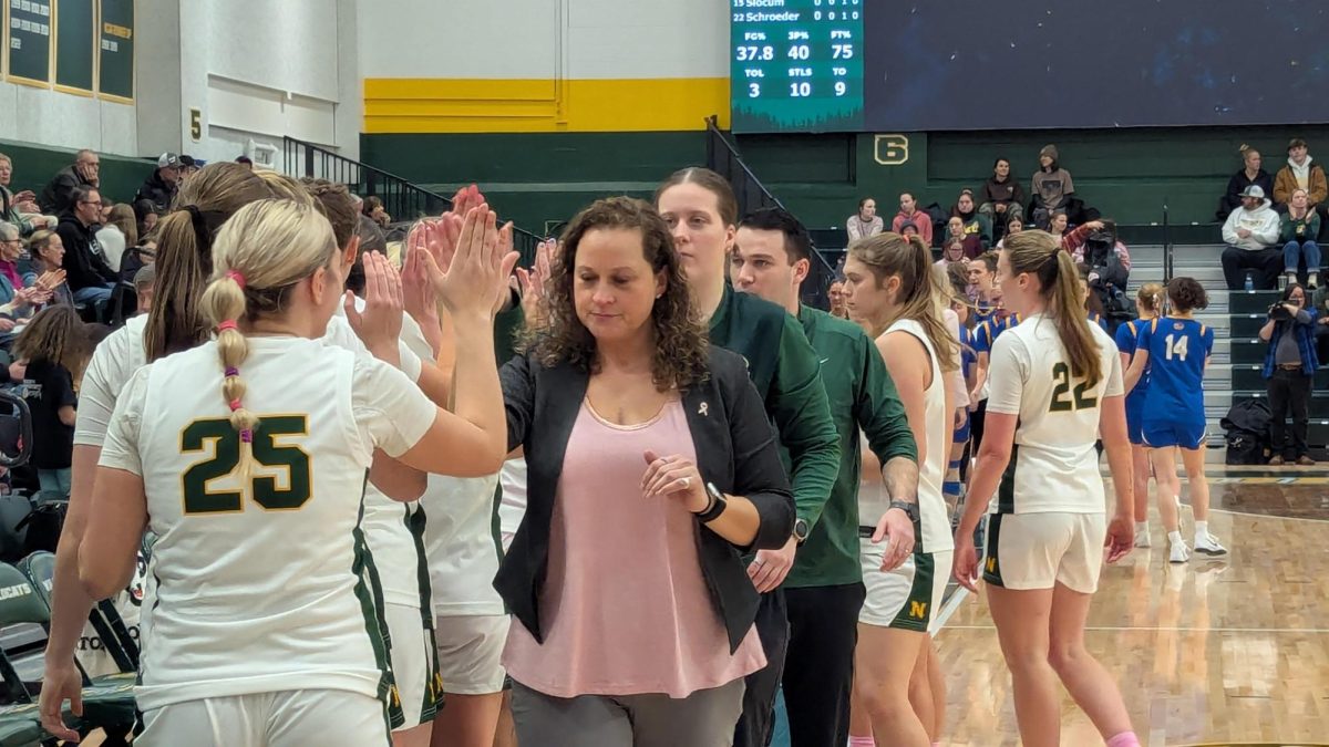 SWEET VICTORY—  NMU celebrates another victory at home.
