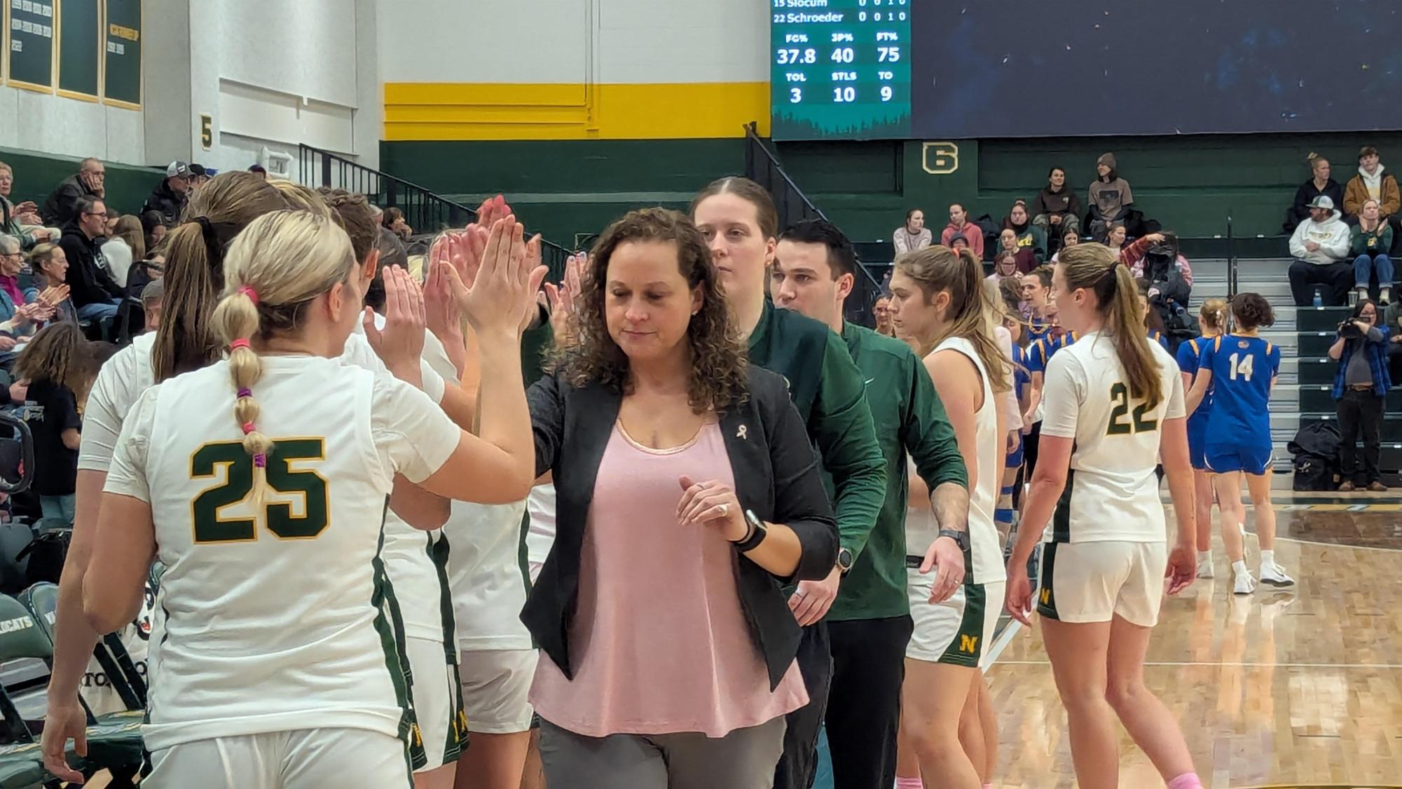 SWEET VICTORY—  NMU celebrates another victory at home.