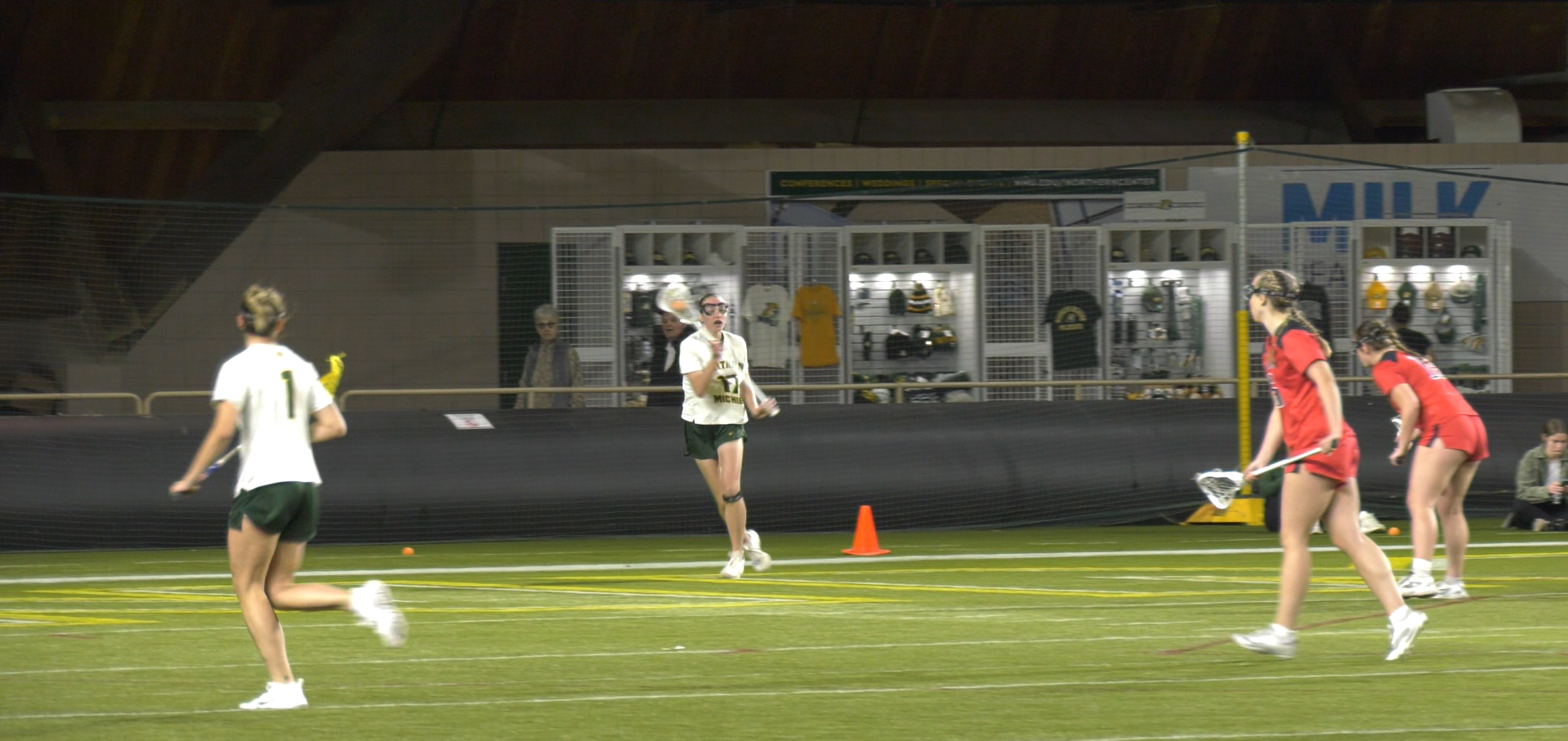 LOOKING - The Wildcat offense sets up a play for a goal.