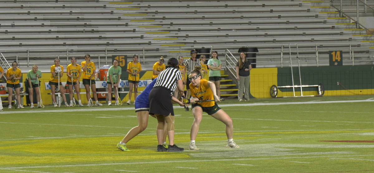 FACE OFF—  NMU prepares for an attack following a resume in action.
